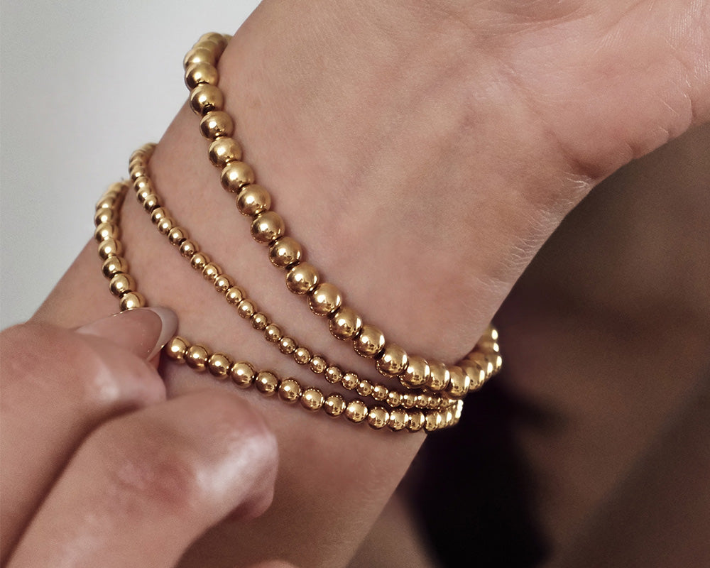 Three bracelets.<br>One effortless look.